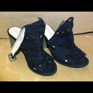 Black Sandals with ankle strap and heel.